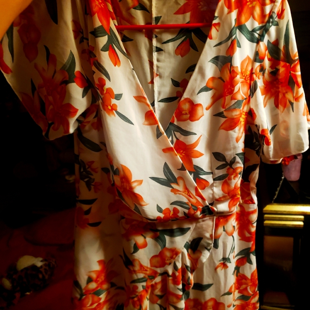 Flowered, wrap front, flowy sundress.